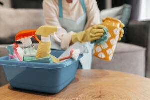 Young woman doing housework and looking busy